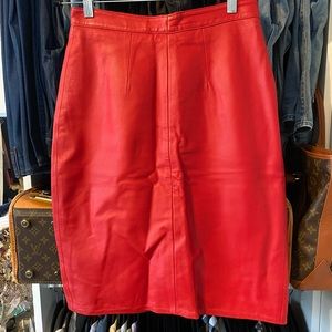 Vintage red leather skirt. Buttery soft, fits higher waisted, stunning on!
